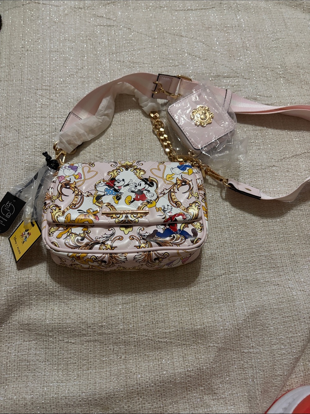 Disney +Aldo women purse.